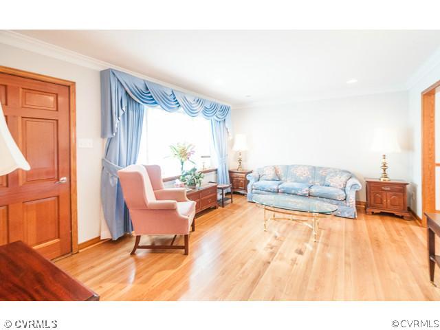6433 Commander Road Richmond, VA 23224 - Photo 16 of 21 a living room with furniture and a large window