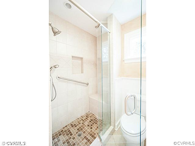 6433 Commander Road Richmond, VA 23224 - Photo 5 of 21 a bathroom with a shower and a sink