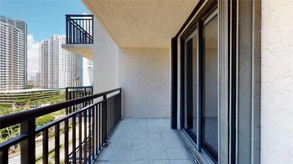 a view of a hallway with windows
