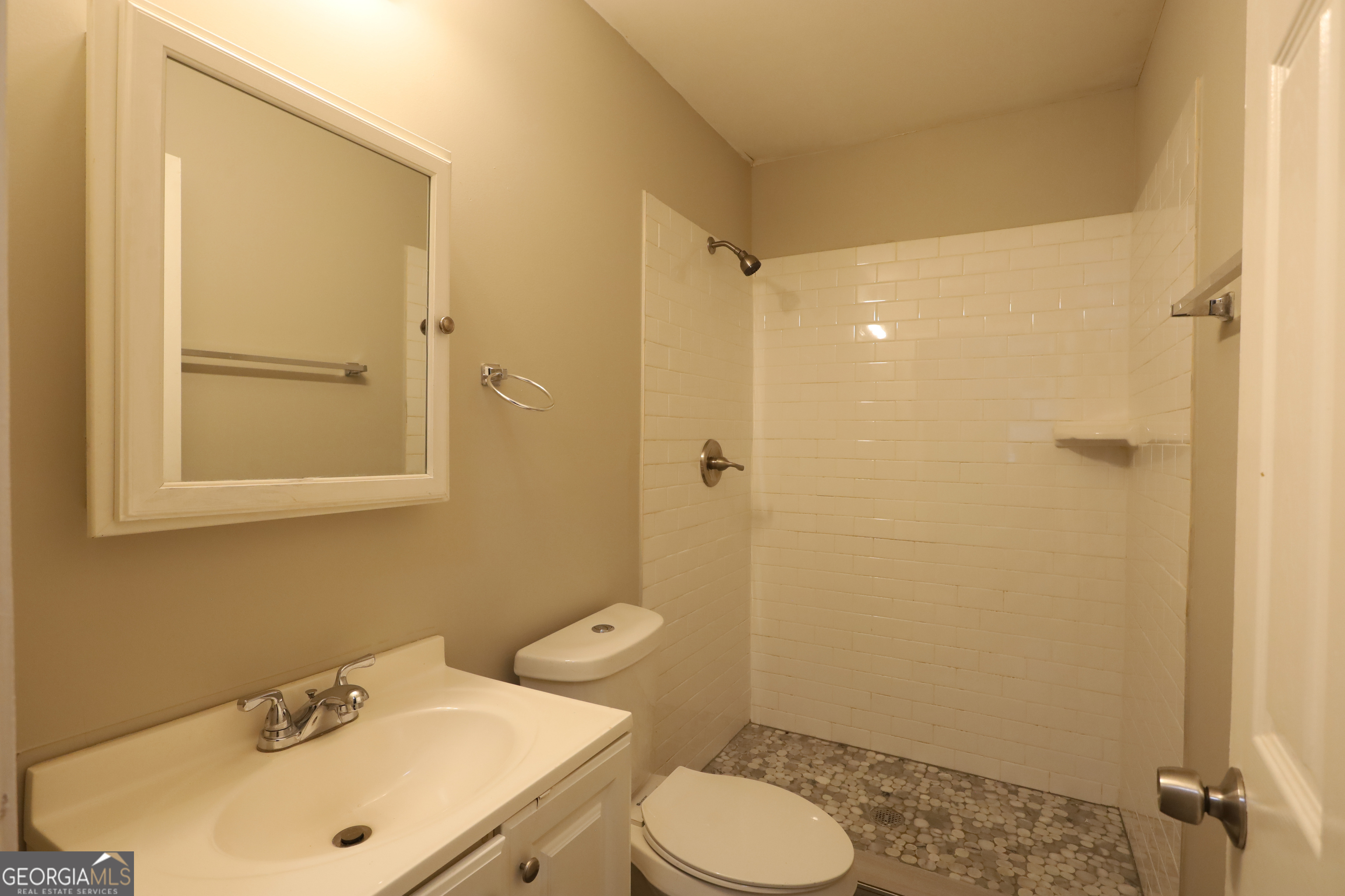 3410 Adkins Road Northwest Atlanta, GA 30331 - Photo 8 of 11 a bathroom with a sink toilet and shower