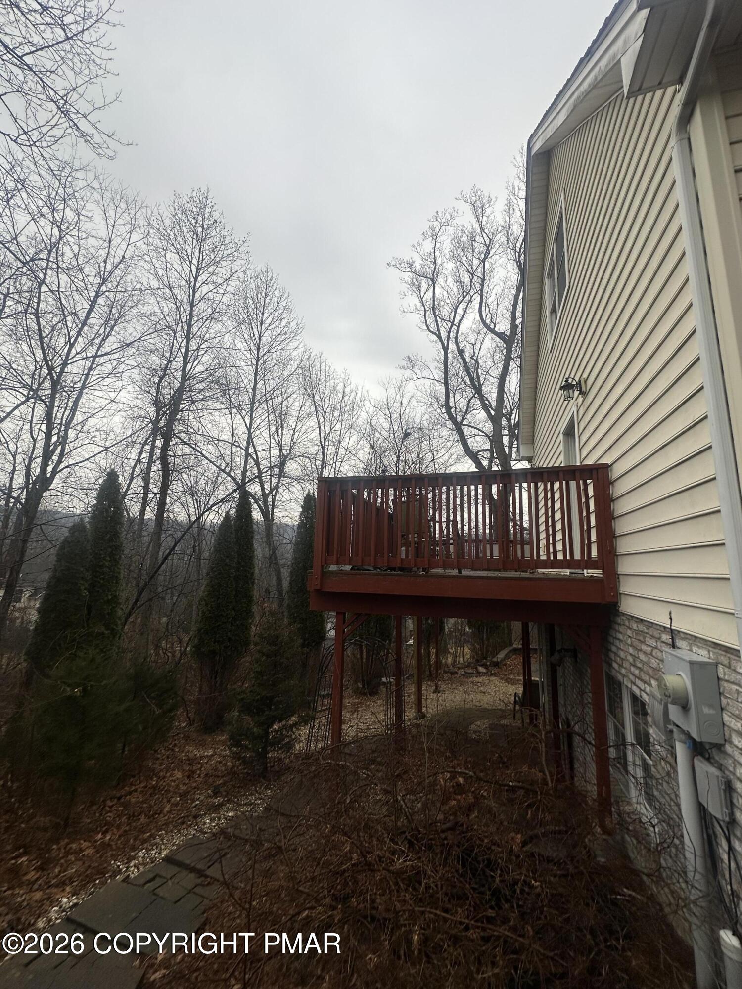 2 Shepard Court Delaware Water Gap, PA 18327 - Photo 12 of 57 a wooden bench sitting in the middle of a yard