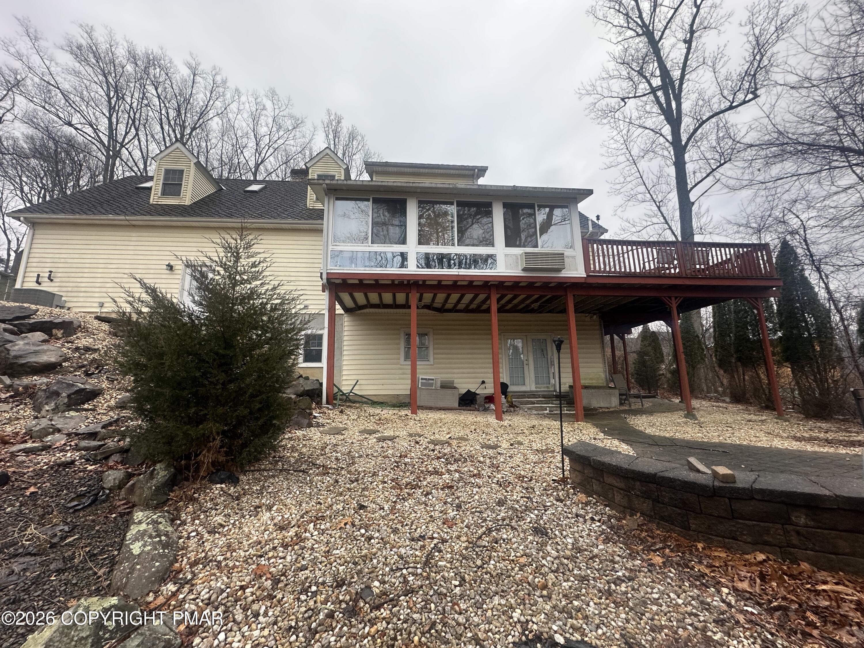 2 Shepard Court Delaware Water Gap, PA 18327 - Photo 13 of 57 a front view of a house with garden