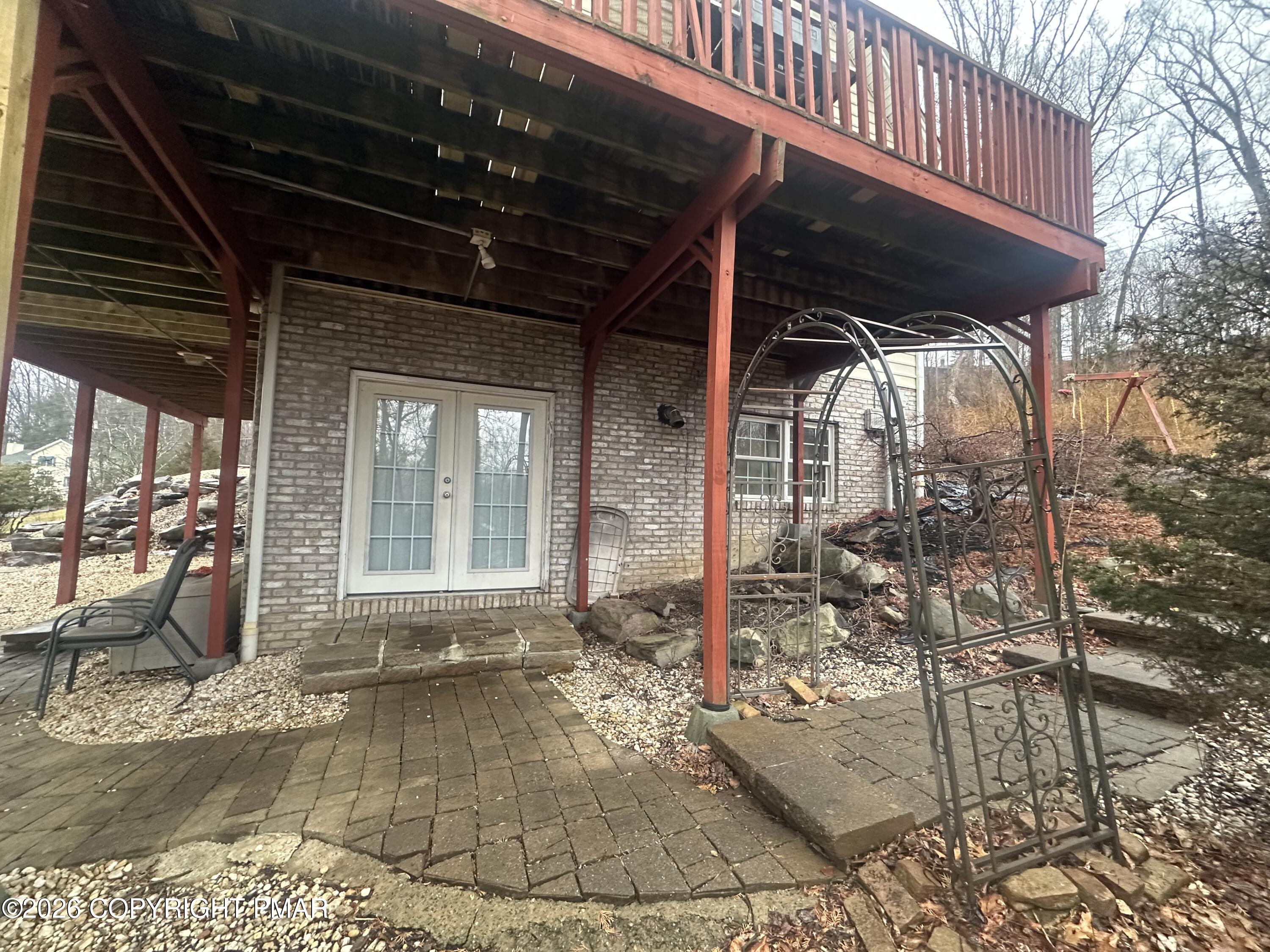 2 Shepard Court Delaware Water Gap, PA 18327 - Photo 14 of 57 a view of a porch with a patio