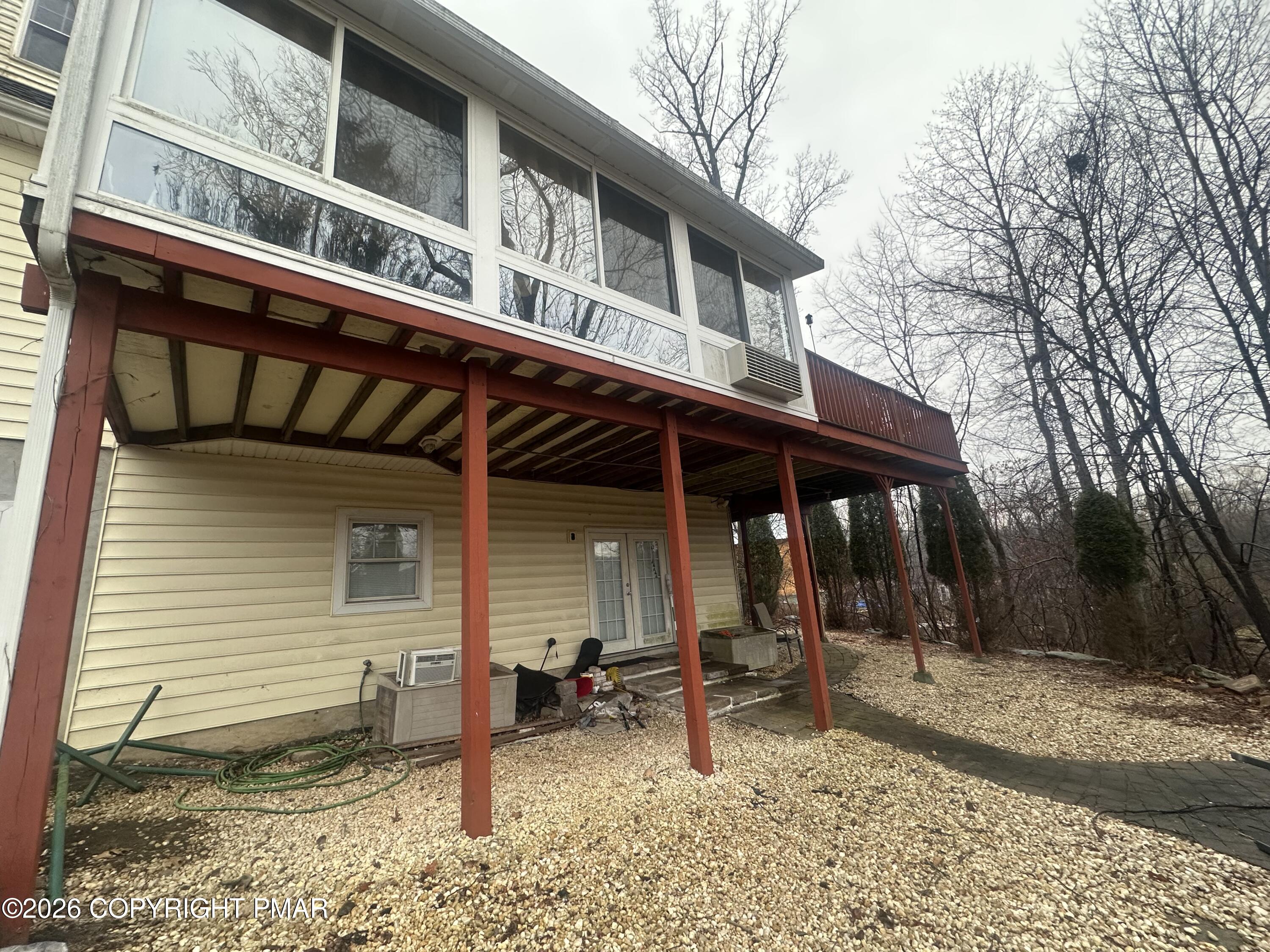 2 Shepard Court Delaware Water Gap, PA 18327 - Photo 15 of 57 a view of a house with a yard and wooden fence