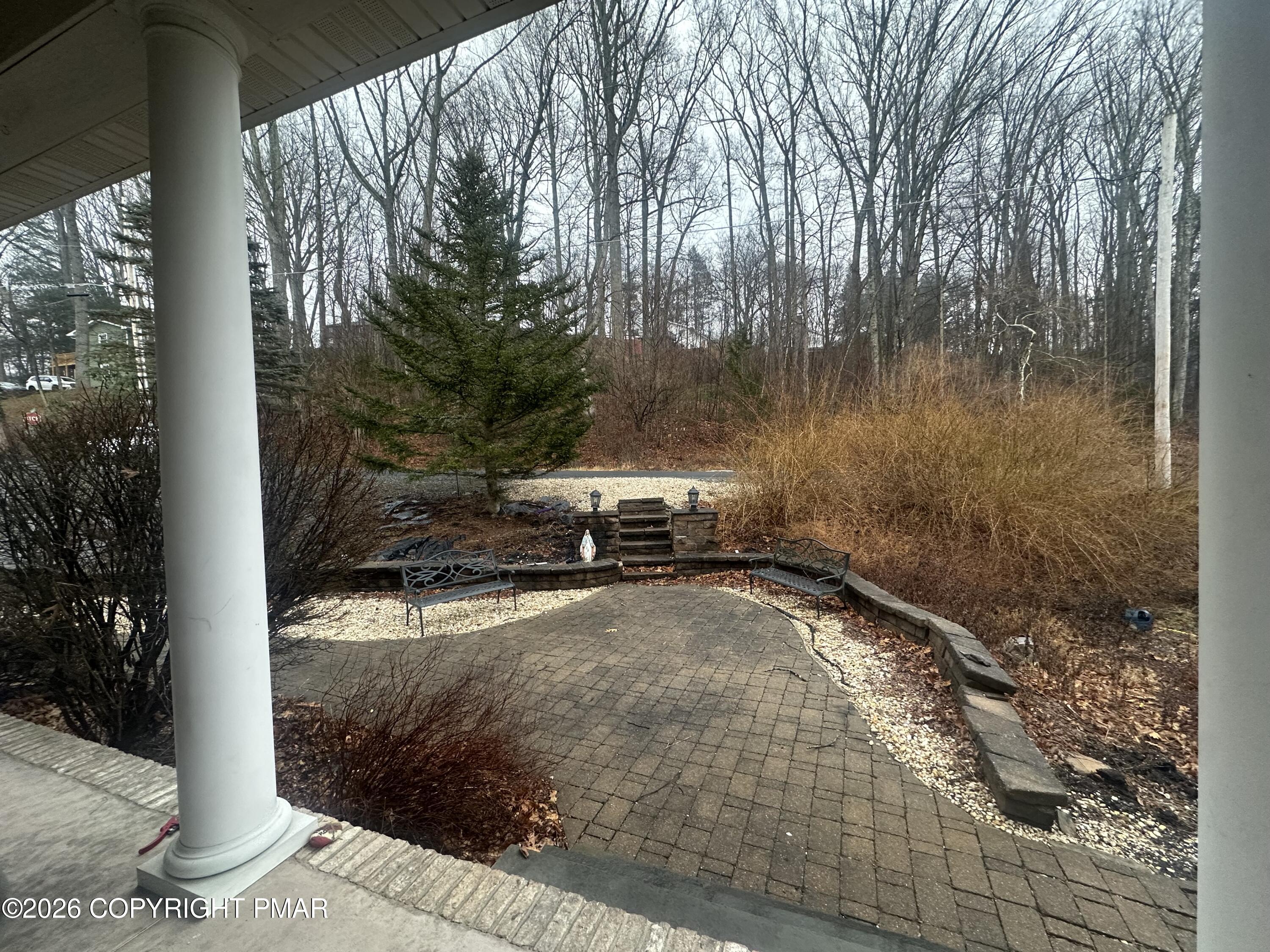 2 Shepard Court Delaware Water Gap, PA 18327 - Photo 17 of 57 a view of a back yard of the house and a yard