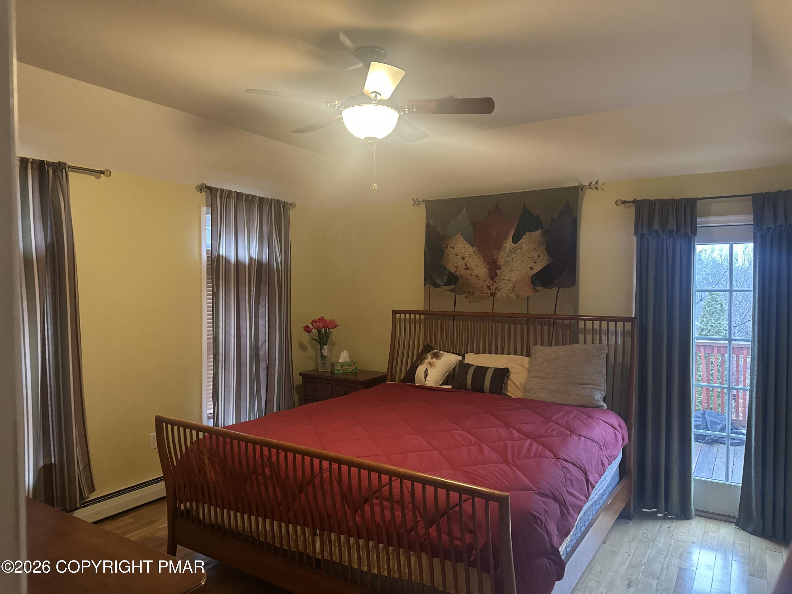 2 Shepard Court Delaware Water Gap, PA 18327 - Photo 28 of 57 a bedroom with a bed and a painting on the wall