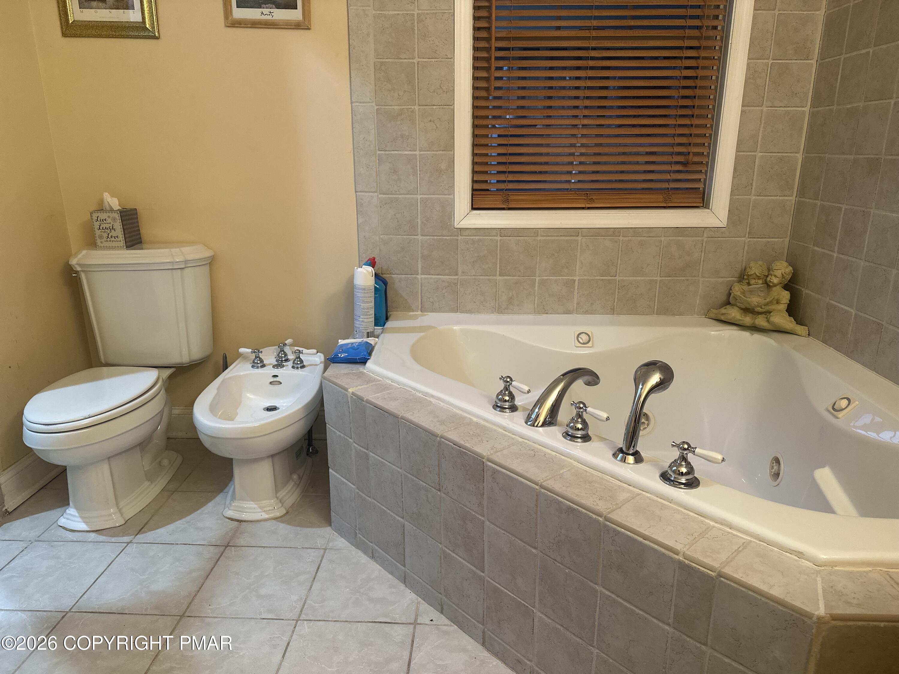 2 Shepard Court Delaware Water Gap, PA 18327 - Photo 32 of 57 a bathroom with a toilet and a bathtub