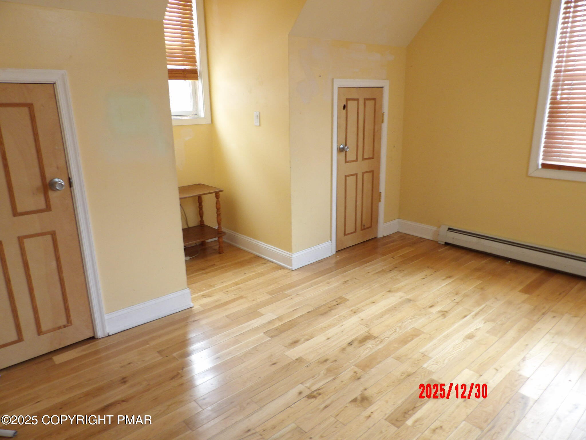 2 Shepard Court Delaware Water Gap, PA 18327 - Photo 38 of 57 an empty room with wooden floor and windows