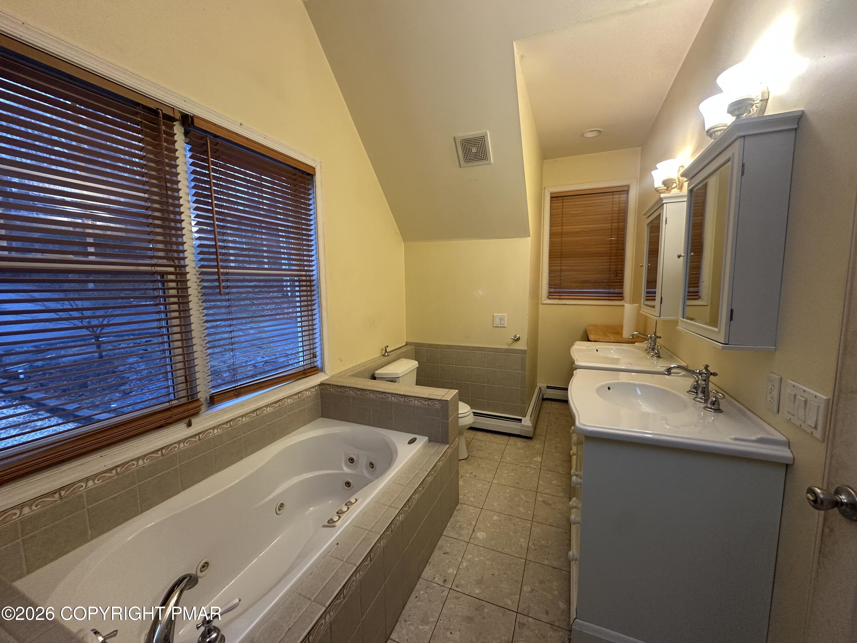 2 Shepard Court Delaware Water Gap, PA 18327 - Photo 44 of 57 a bathroom with a tub sink and mirror