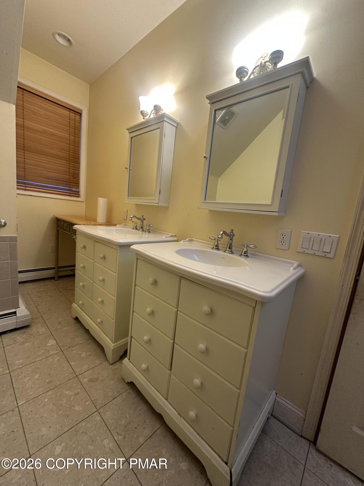 2 Shepard Court Delaware Water Gap, PA 18327 - Photo 46 of 57 a bathroom with a double vanity sink mirror and