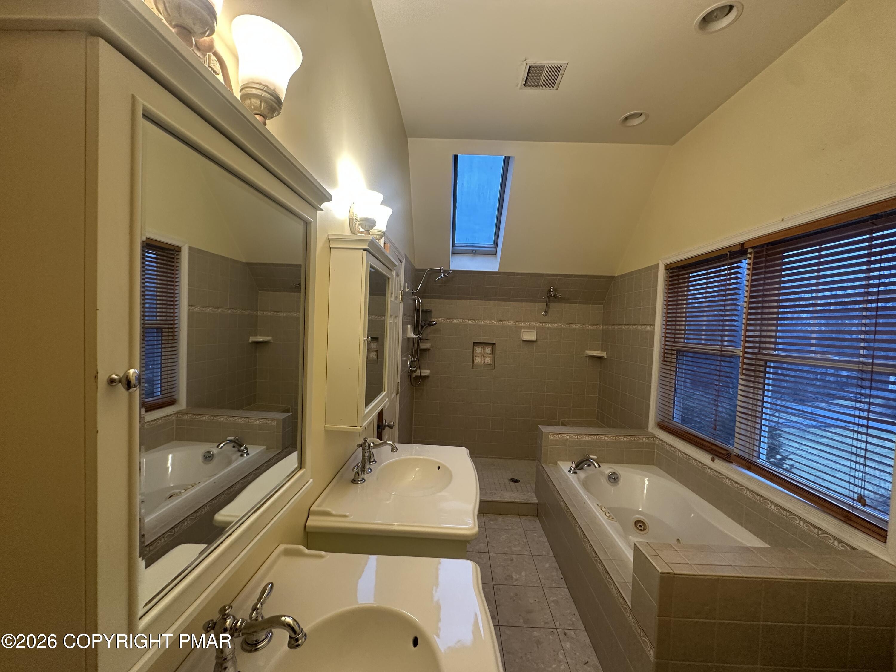 2 Shepard Court Delaware Water Gap, PA 18327 - Photo 47 of 57 a bathroom with a tub sink and mirror