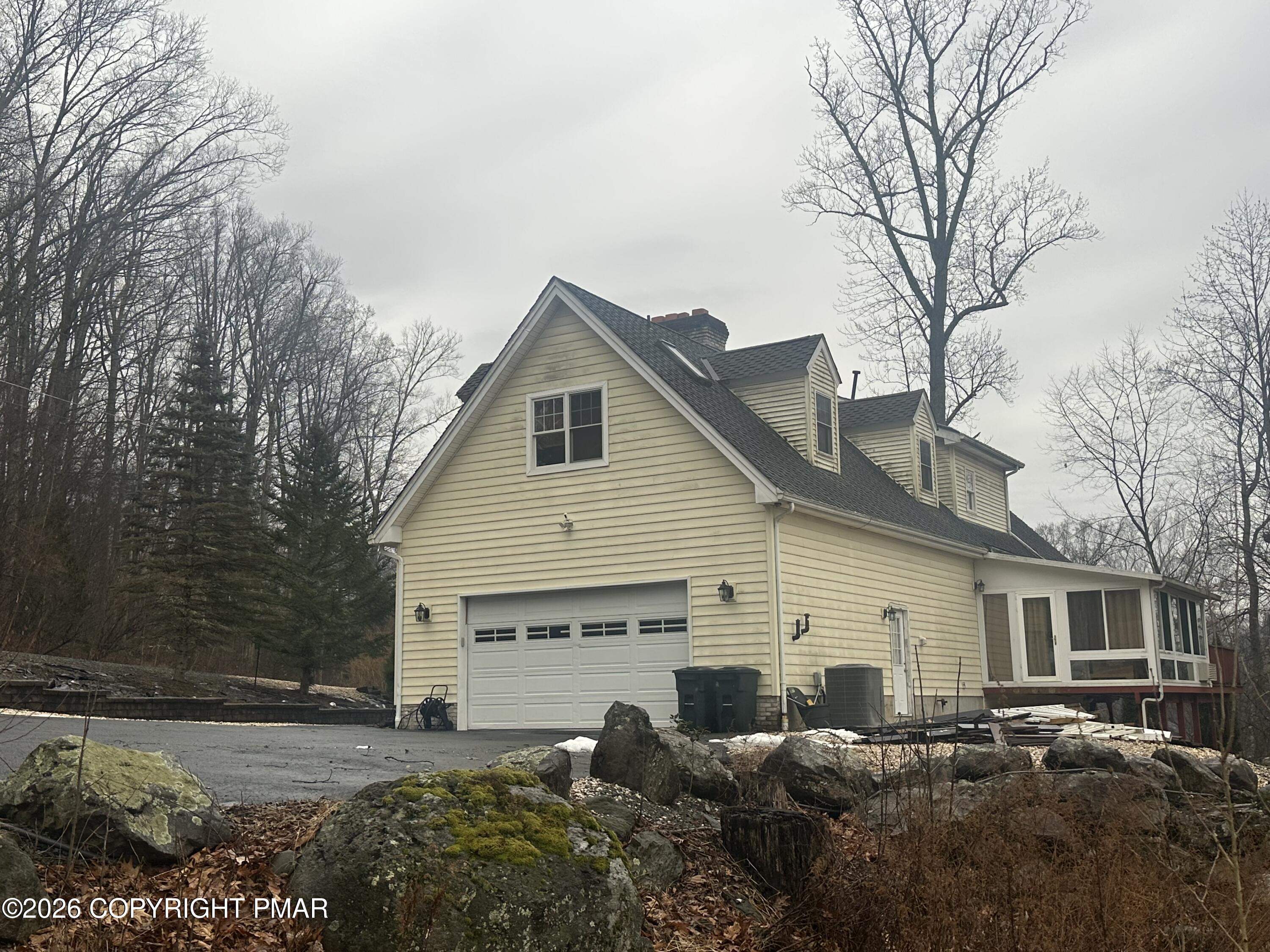 2 Shepard Court Delaware Water Gap, PA 18327 - Photo 5 of 57 a view of a house with a patio