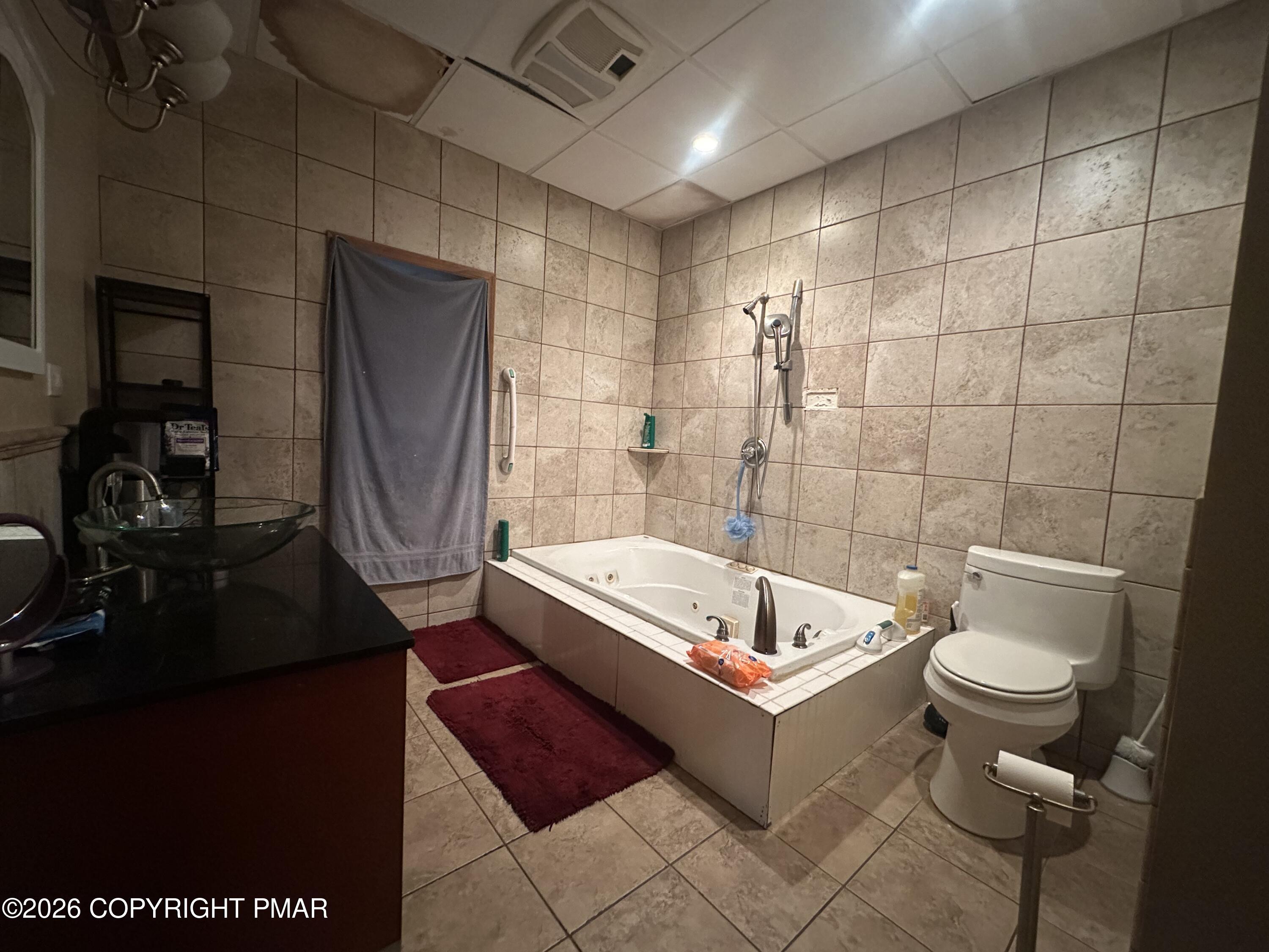 2 Shepard Court Delaware Water Gap, PA 18327 - Photo 52 of 57 a bathroom with a sink a toilet and bathtub