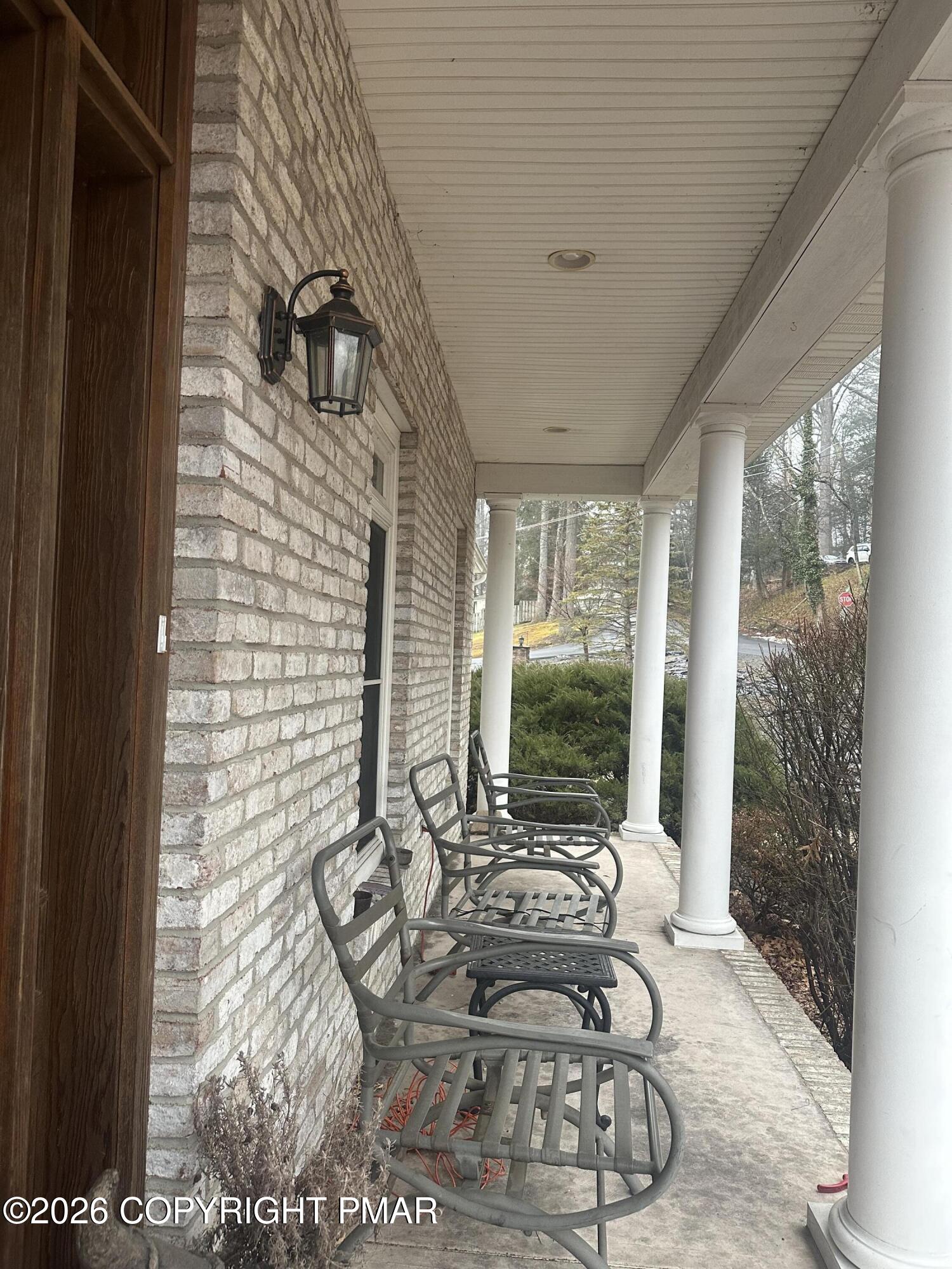 2 Shepard Court Delaware Water Gap, PA 18327 - Photo 7 of 57 a living room with fireplace furniture and a flat screen tv