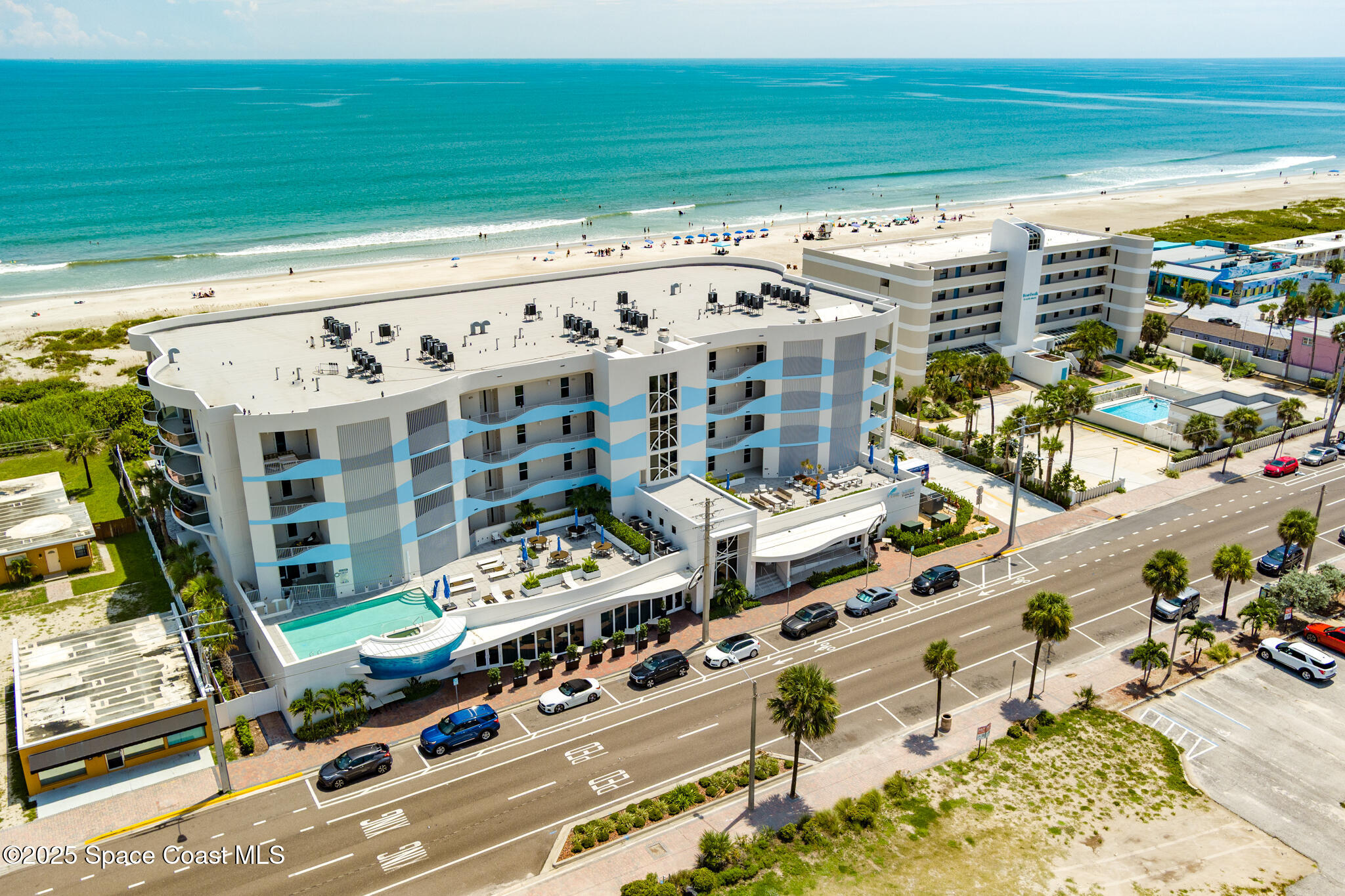 65 North Atlantic Avenue, Unit 404 Cocoa Beach, FL 32931 - Photo 1 of 57 The Surf Oceanfront Condo