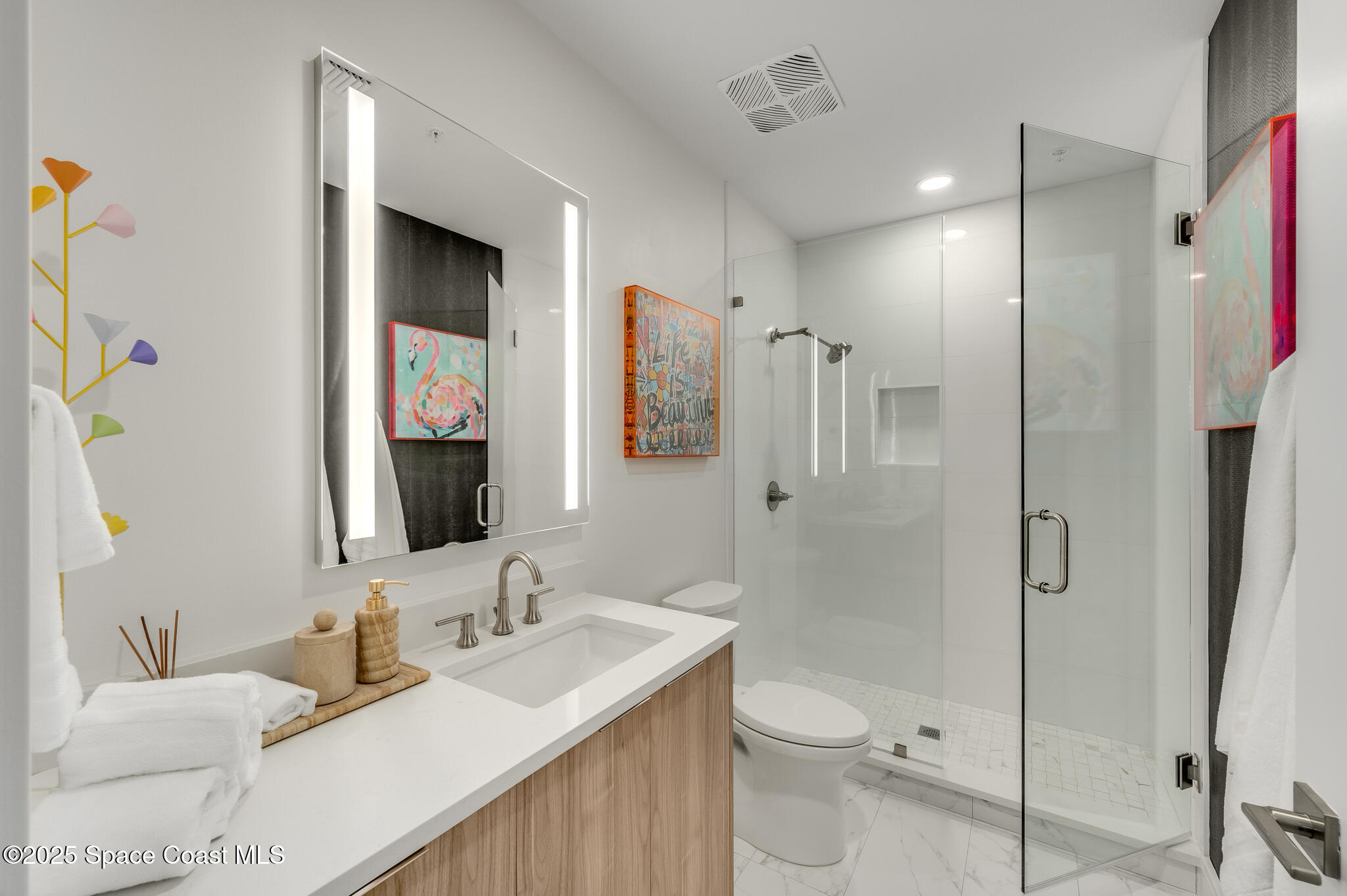 65 North Atlantic Avenue, Unit 404 Cocoa Beach, FL 32931 - Photo 12 of 57 Bedroom 2 full bath with shower