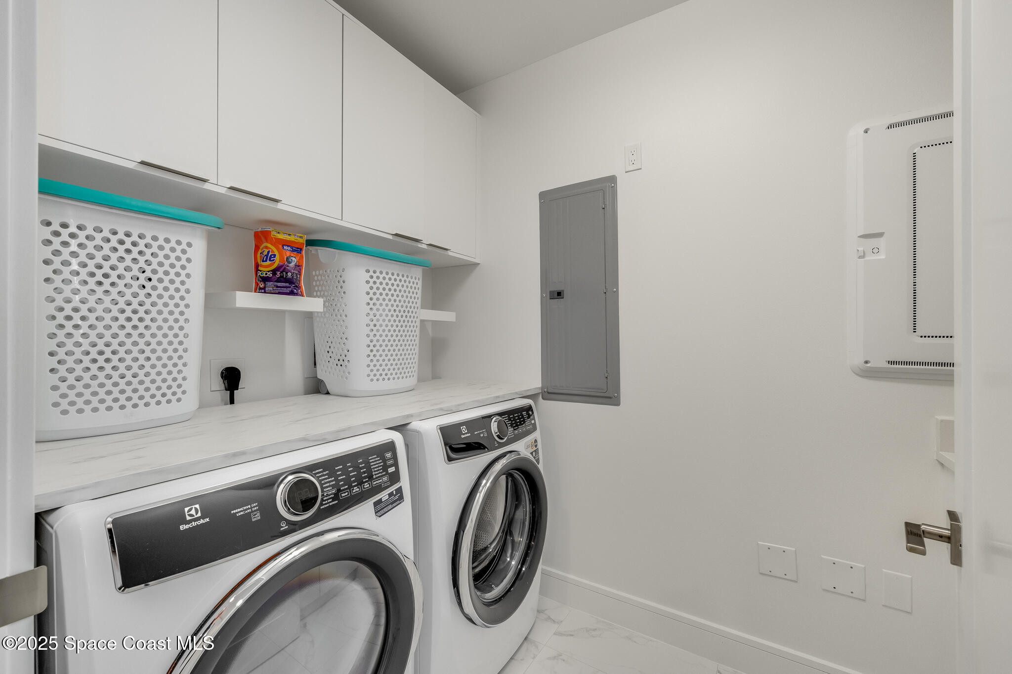 65 North Atlantic Avenue, Unit 404 Cocoa Beach, FL 32931 - Photo 15 of 57 laundry