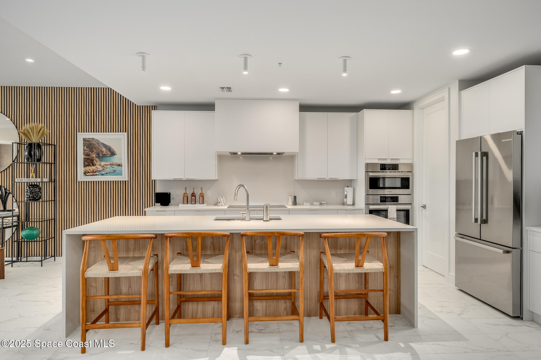 65 North Atlantic Avenue, Unit 404 Cocoa Beach, FL 32931 - Photo 24 of 57 View of kitchen from family room