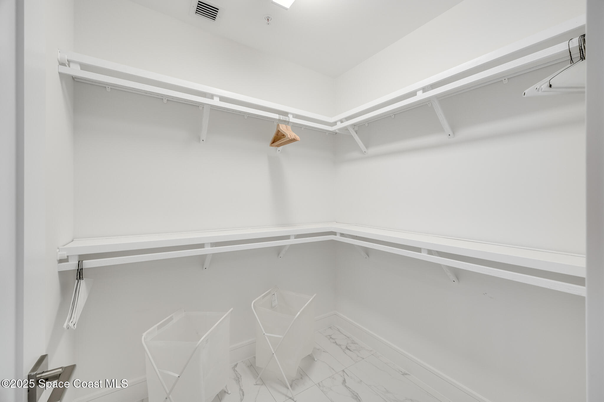 65 North Atlantic Avenue, Unit 404 Cocoa Beach, FL 32931 - Photo 48 of 57 2nd Walk in closet