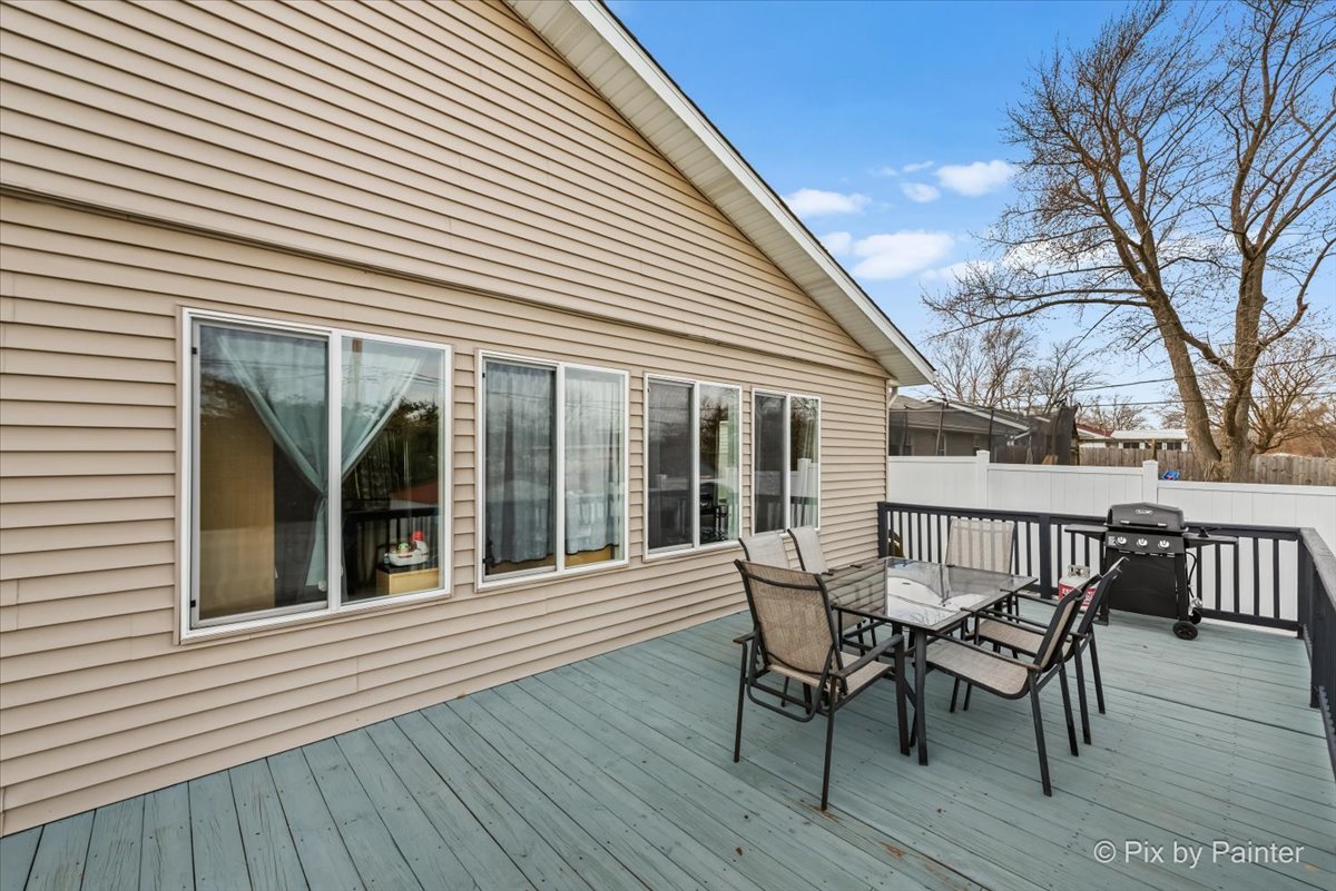 27 South Oltendorf Road Streamwood, IL 60107 - Photo 28 of 31 a view of a wooden chairs on the deck