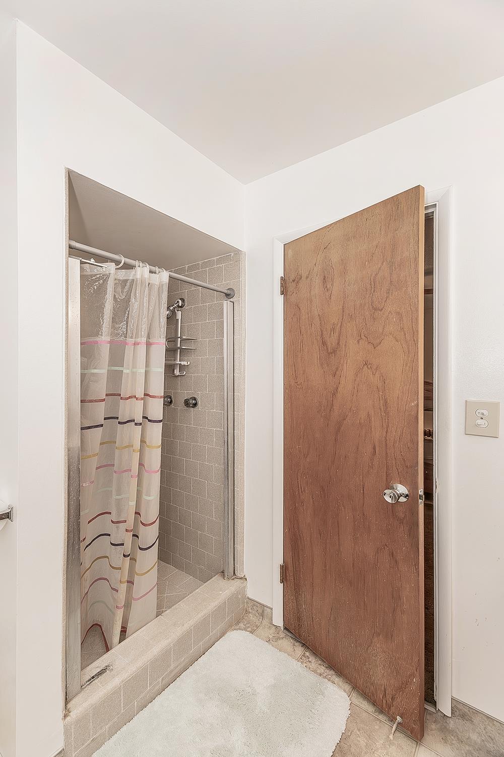 1350 Mill Street Selma, CA 93662 - Photo 21 of 47 a bathroom with a shower and a sink