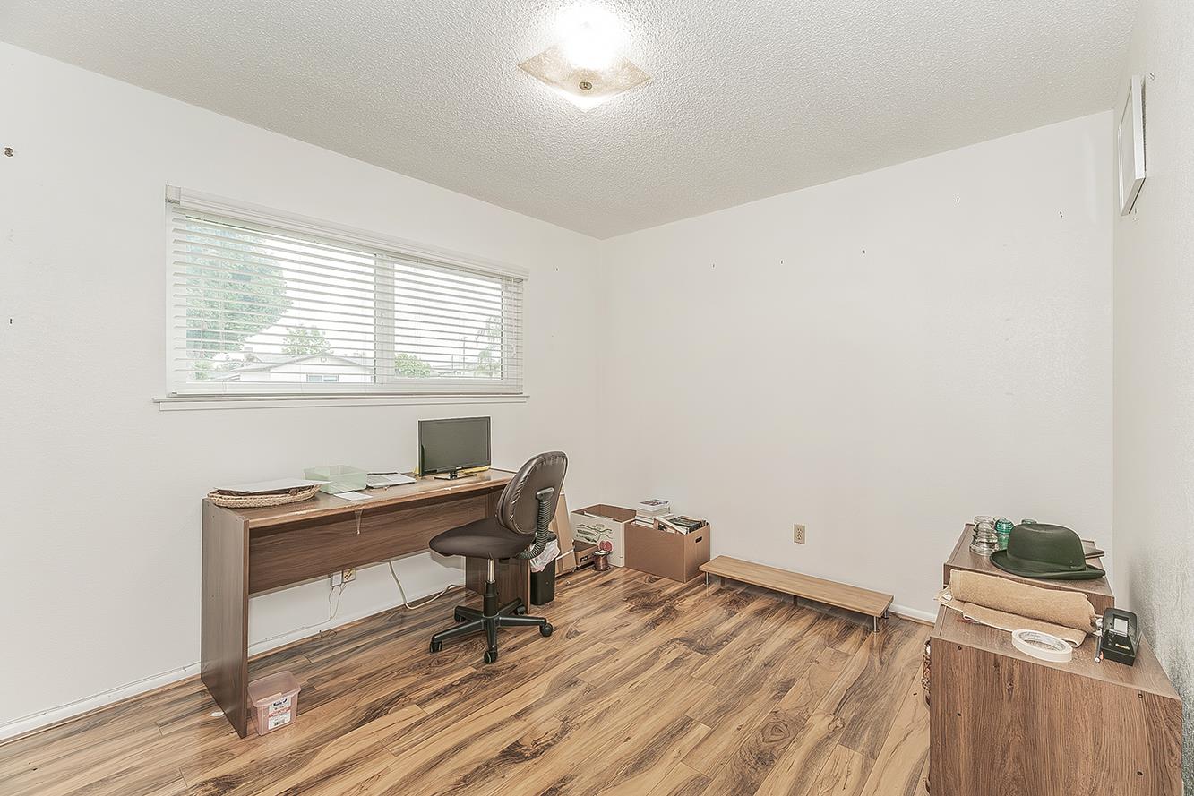 1350 Mill Street Selma, CA 93662 - Photo 26 of 47 a view of a workspace with furniture and a window