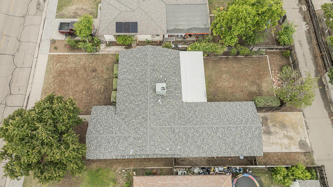1350 Mill Street Selma, CA 93662 - Photo 3 of 47 an aerial view of a house with outdoor space