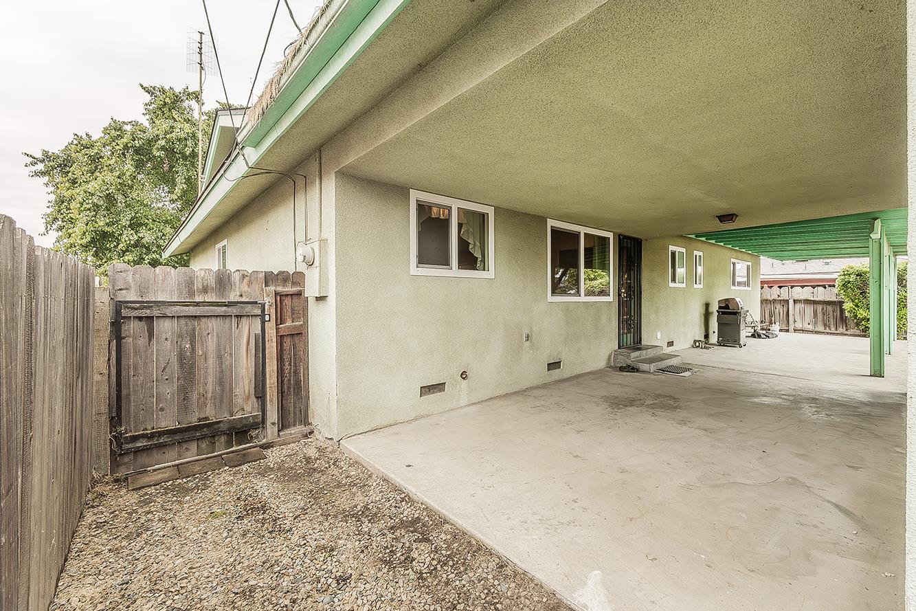 1350 Mill Street Selma, CA 93662 - Photo 33 of 47 a view of a house with a backyard