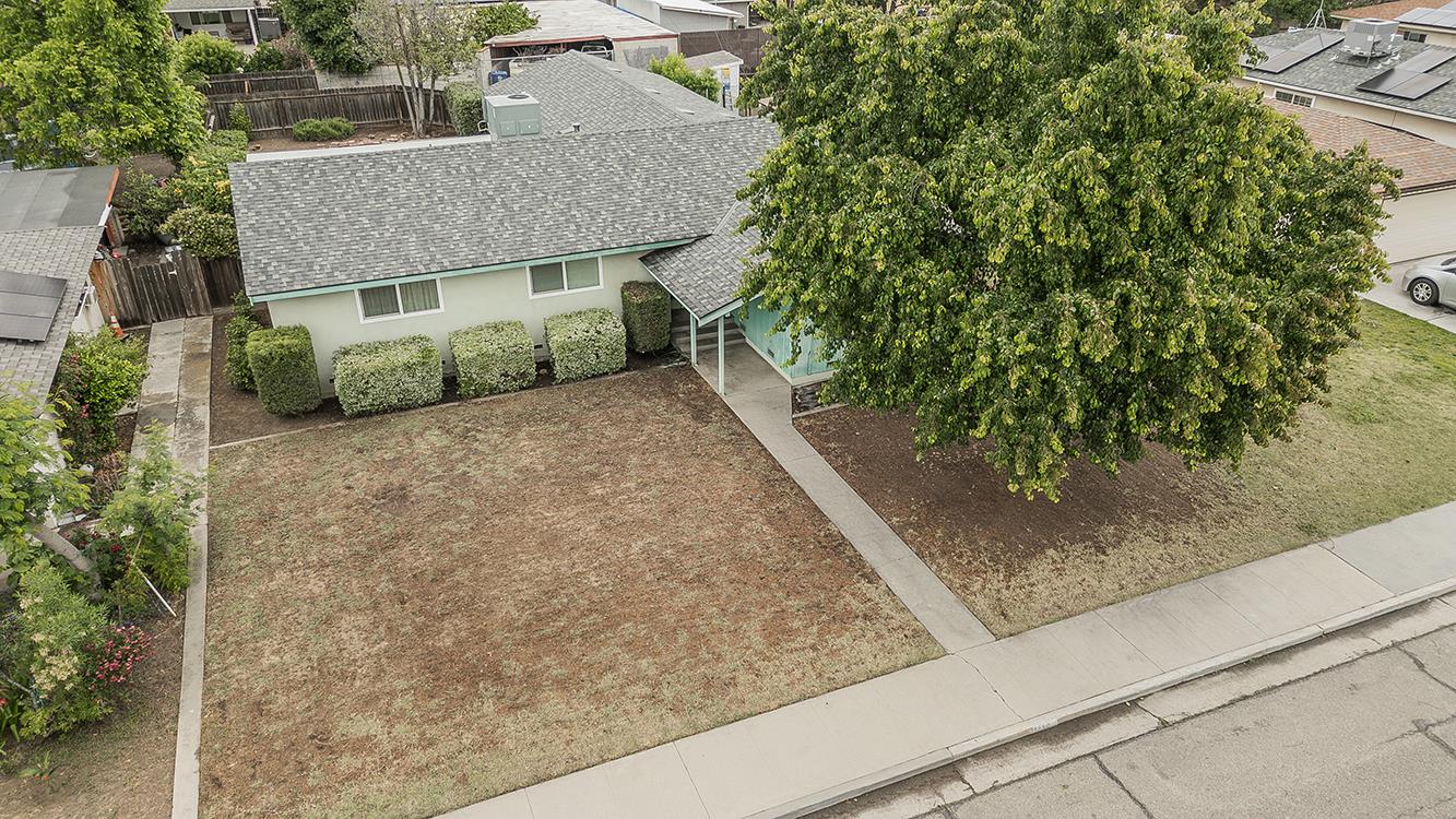 1350 Mill Street Selma, CA 93662 - Photo 37 of 47 a aerial view of a house with a yard and garage