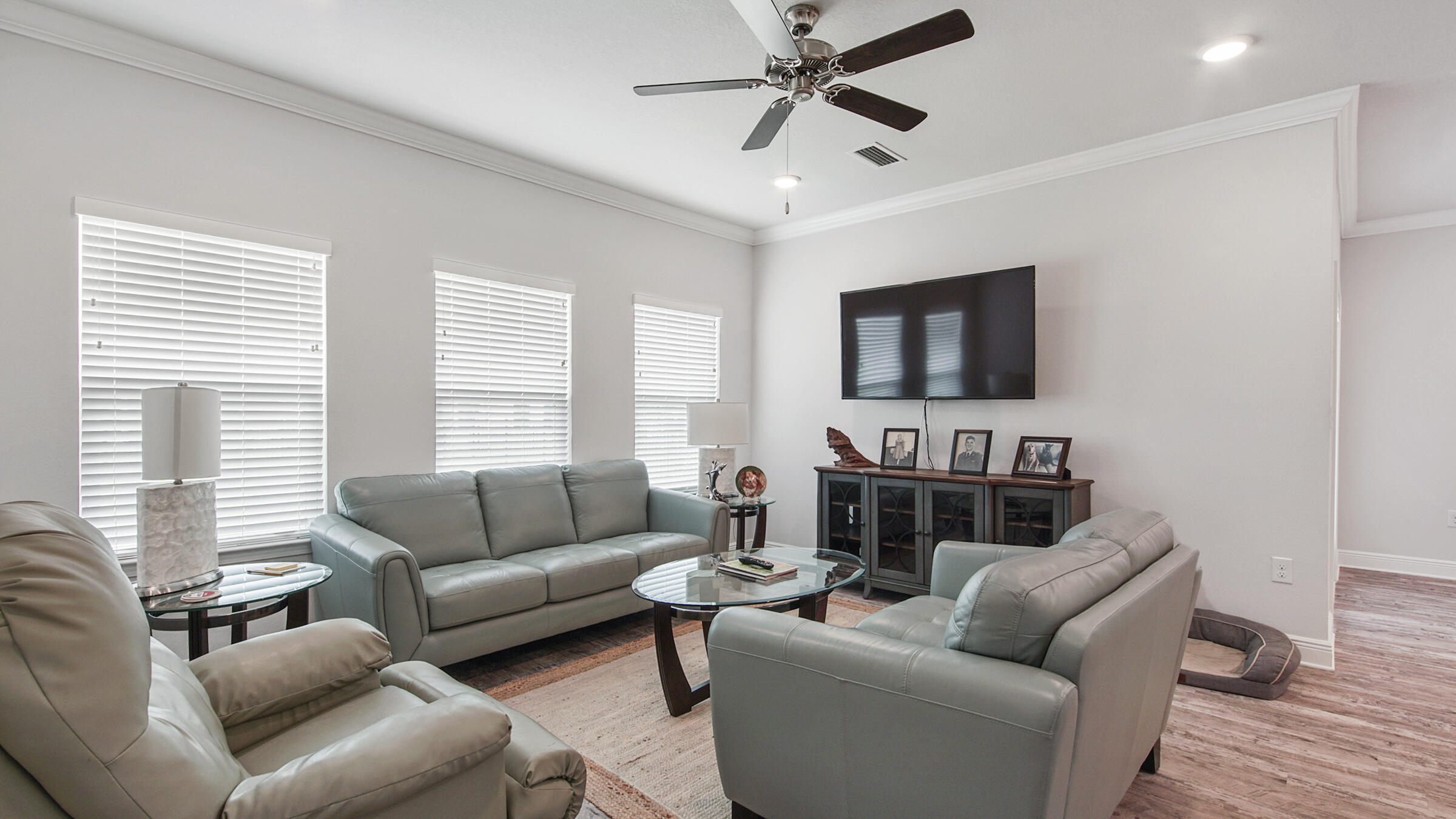 158 Lightning Bug Lane Freeport, FL 32439 - Photo 14 of 23 a living room with furniture a flat screen tv and a window