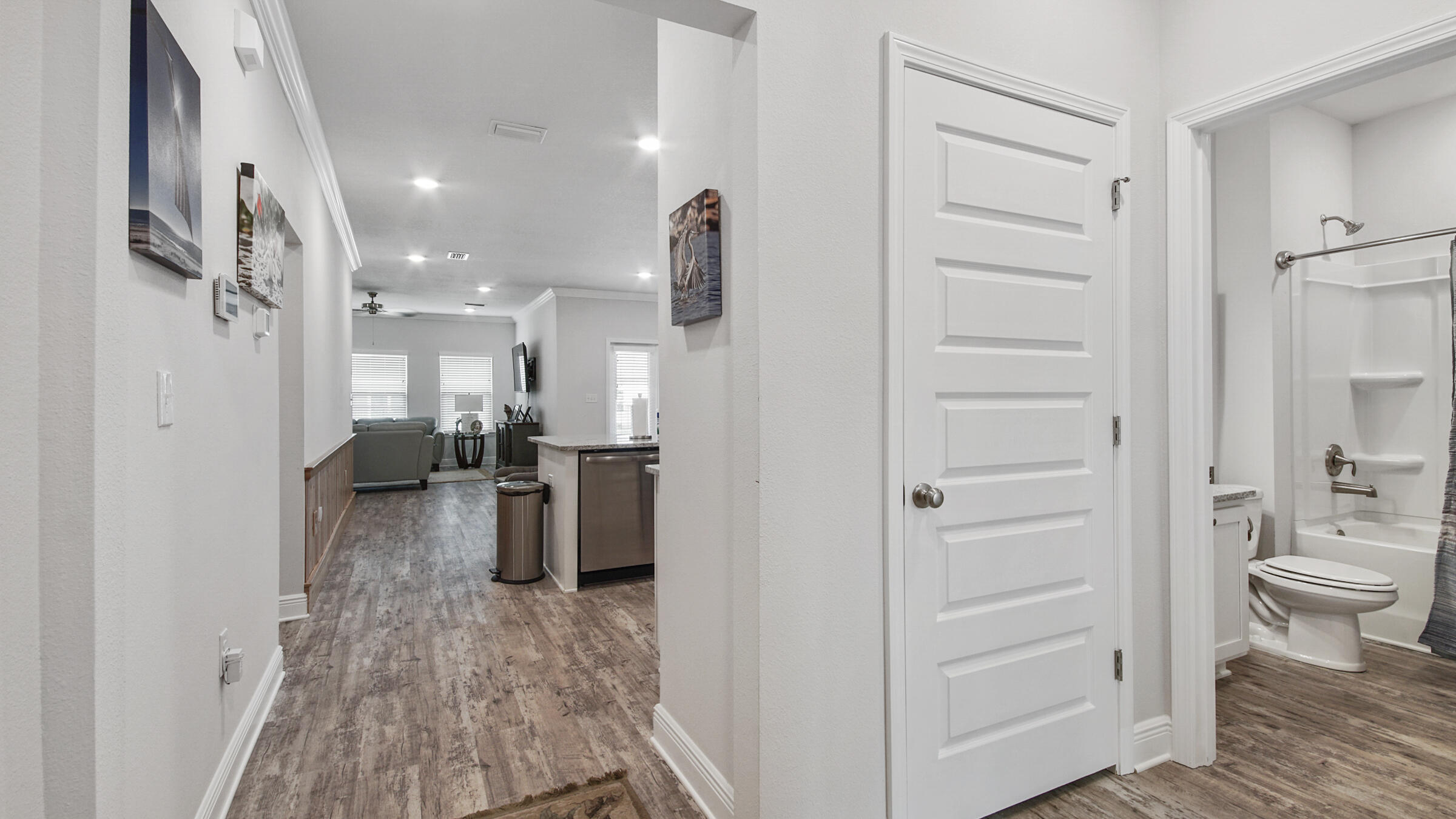 158 Lightning Bug Lane Freeport, FL 32439 - Photo 4 of 23 a view of a kitchen center island and living room