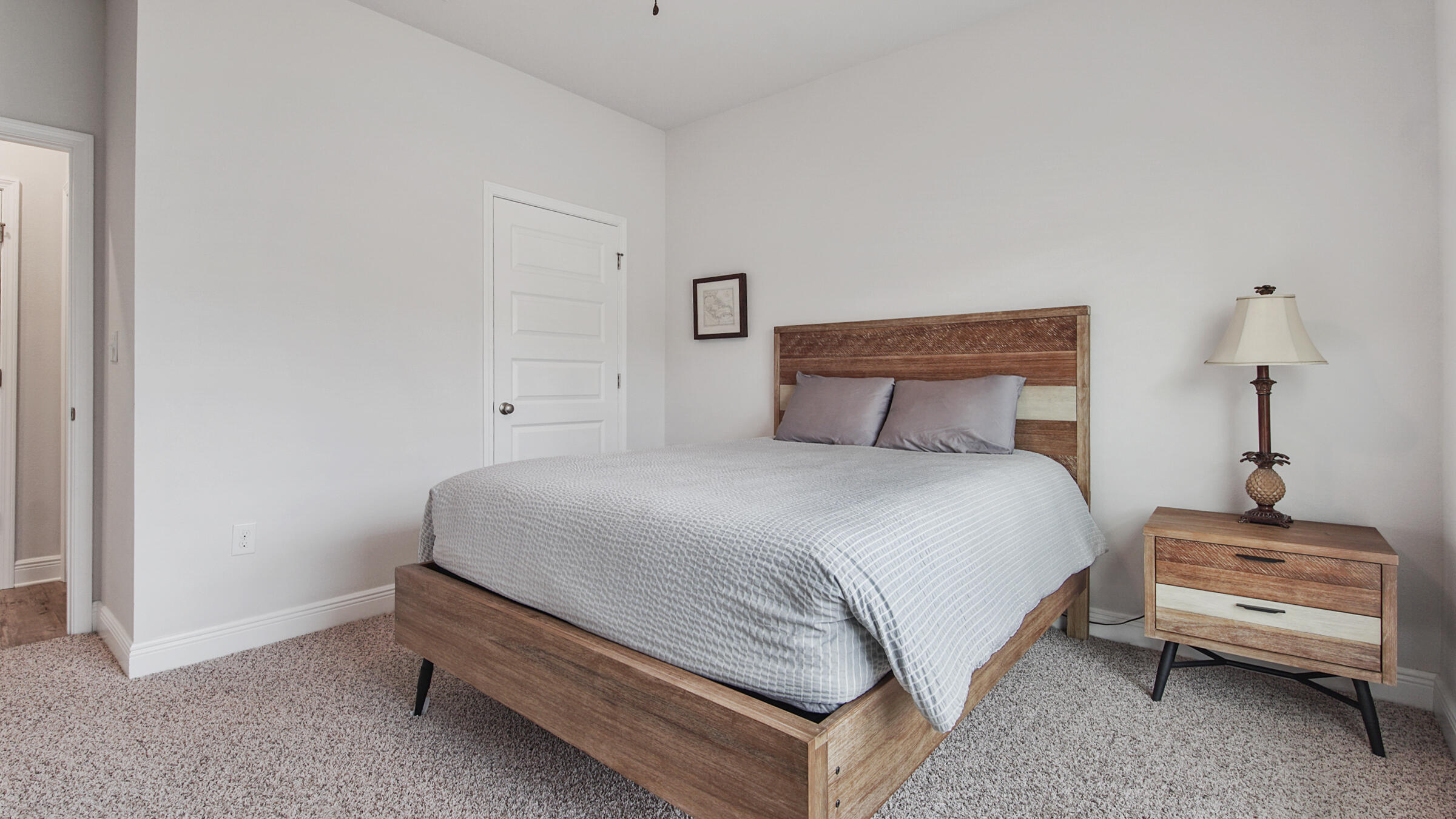 158 Lightning Bug Lane Freeport, FL 32439 - Photo 6 of 23 a bedroom with a bed and a chair