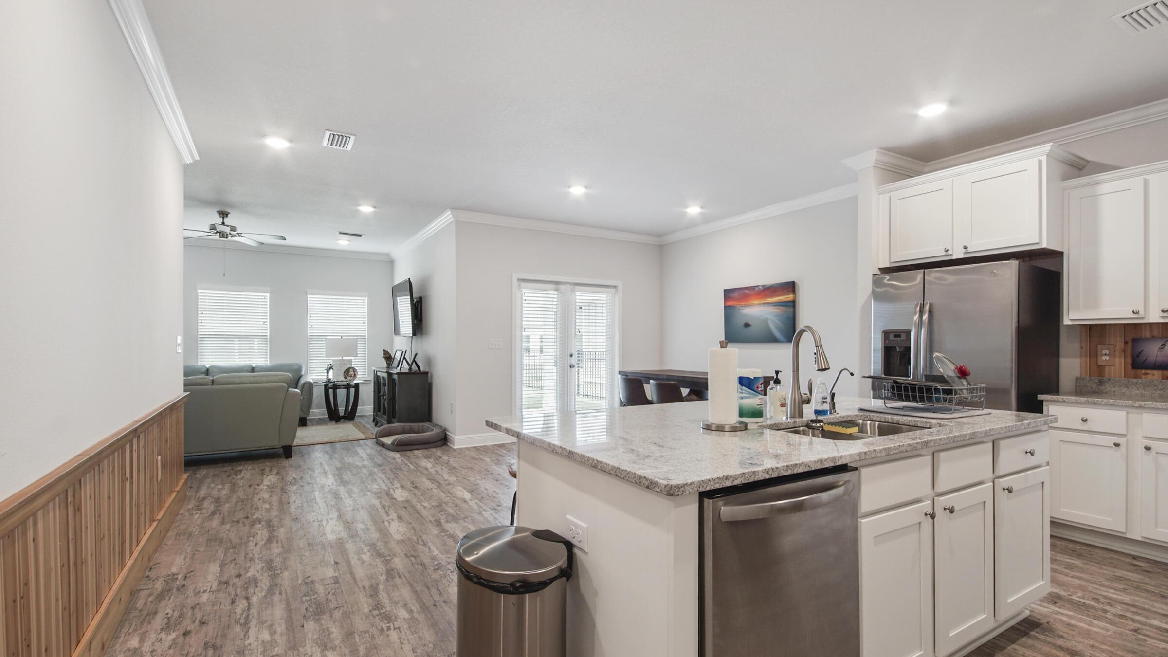 158 Lightning Bug Lane Freeport, FL 32439 - Photo 9 of 23 a large kitchen with a counter space a sink stainless steel appliances and cabinets