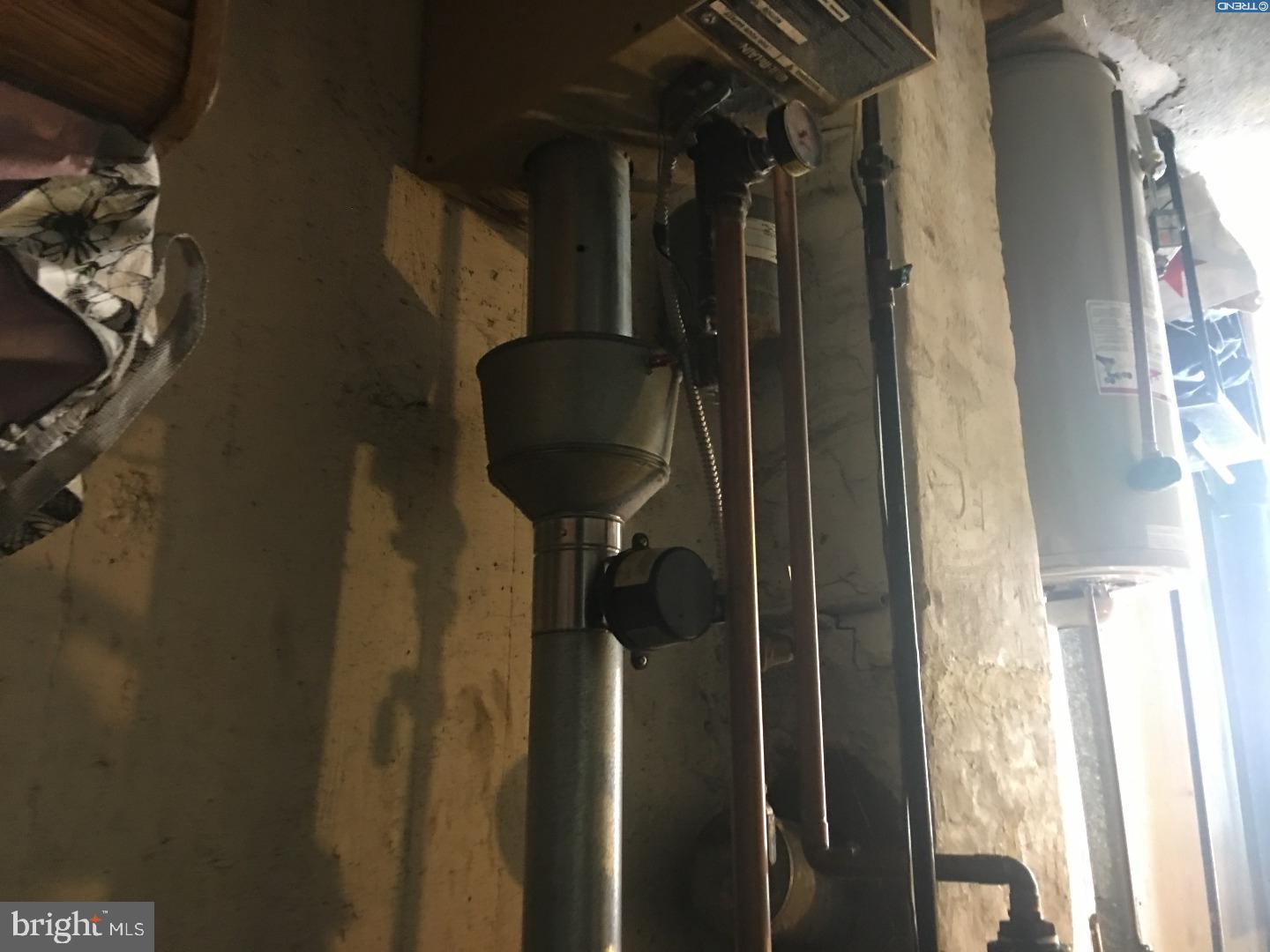 658 Copley Road Upper Darby, PA 19082 - Photo 15 of 19 a close view of water heater room