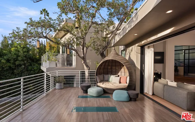 a view of deck with furniture and wooden floor