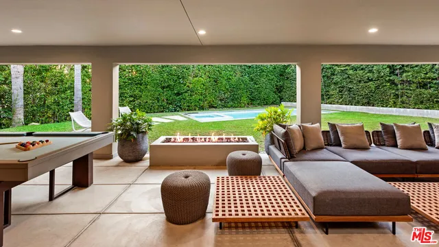 a room with furniture and a large window