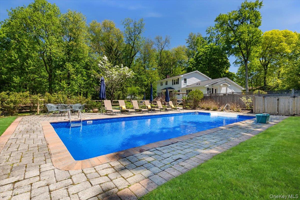 119 Edgewood Road Ossining, NY 10562 - Photo 12 of 50 Go from the backyard into the heated, in-ground pool and patio surround. You'll never want to leave the house in the summer!