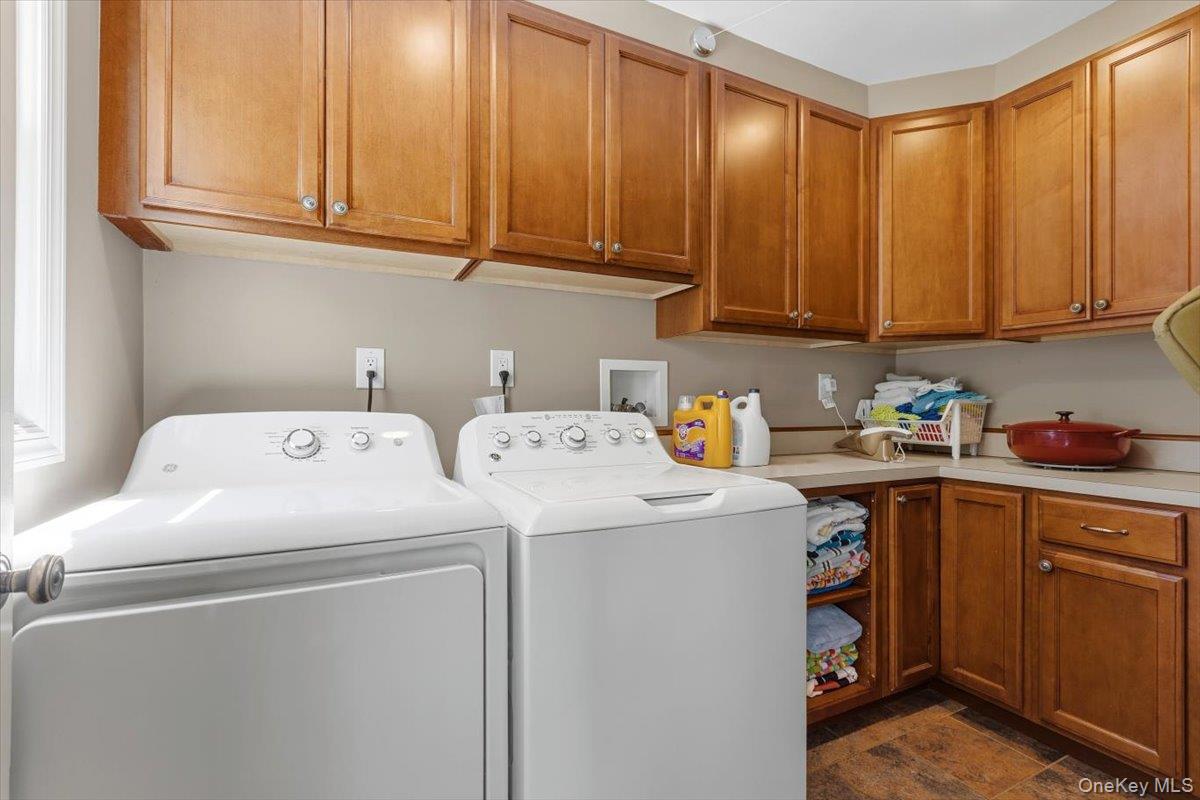 119 Edgewood Road Ossining, NY 10562 - Photo 20 of 50 Loads of storage in the windowed Laundry Room (young washer & dryer).