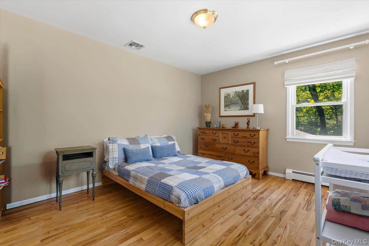 119 Edgewood Road Ossining, NY 10562 - Photo 27 of 50 Hardwood floors in the second BR and custom window shades.