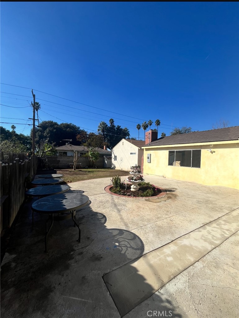 4136 Eileen Street Riverside, CA 92504 - Photo 11 of 13 a front view of a house with a yard