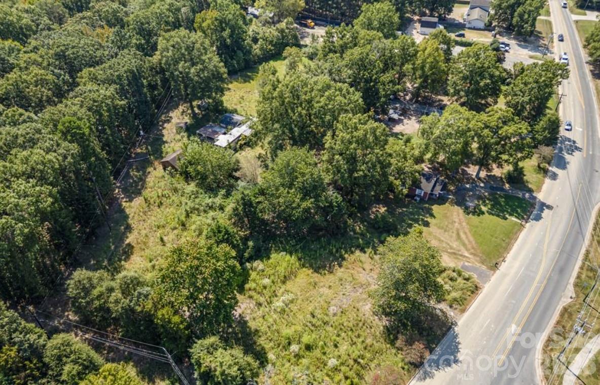 3708 Wesley Chapel Stouts Road Monroe, NC 28110 - Photo 11 of 12 a view of a garden with a tree