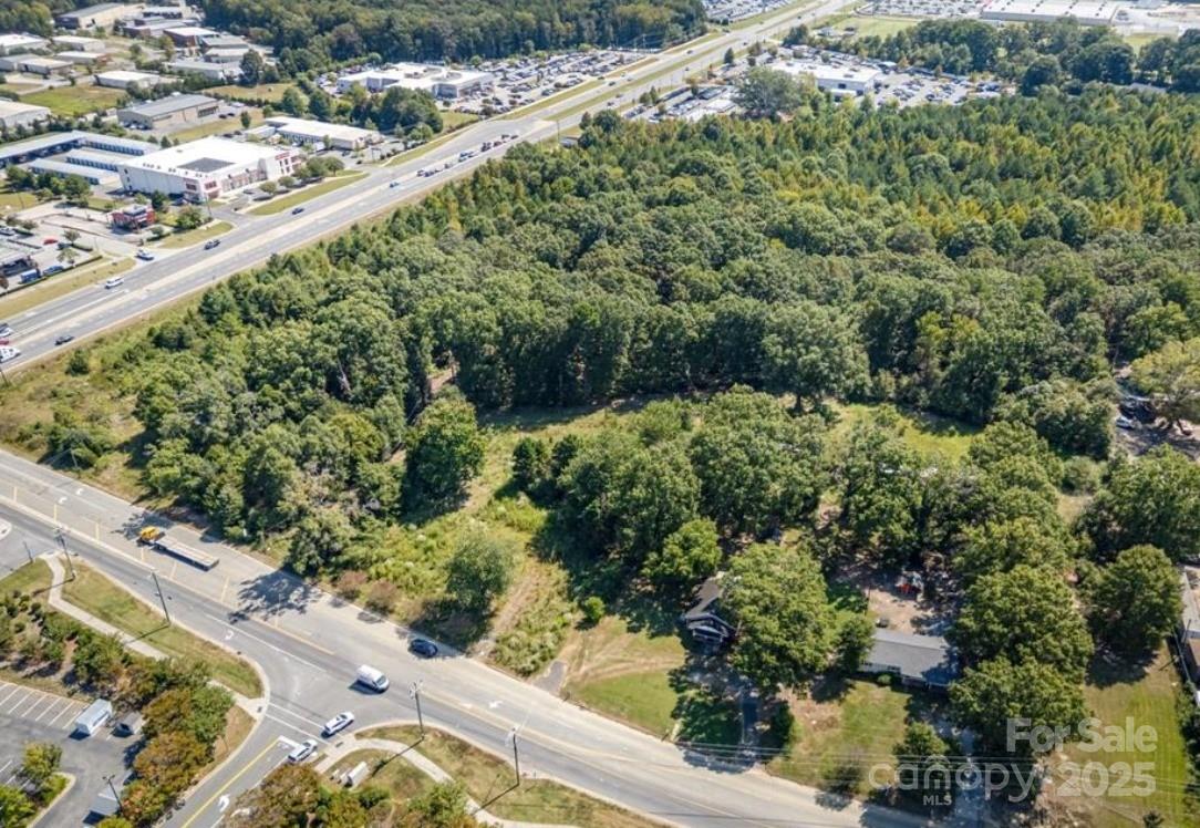 3708 Wesley Chapel Stouts Road Monroe, NC 28110 - Photo 7 of 10 a view of a garden with a pathway