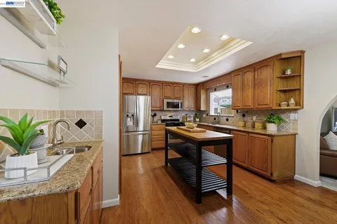 a bedroom with a bed and a table