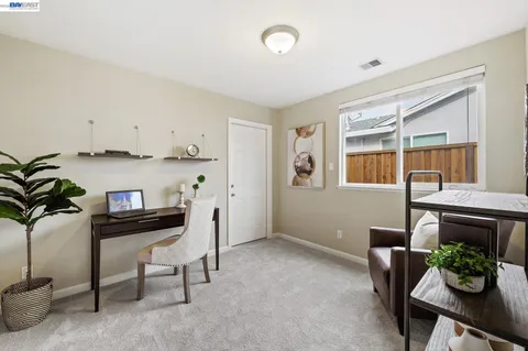 a aerial view of a house with a yard and plants