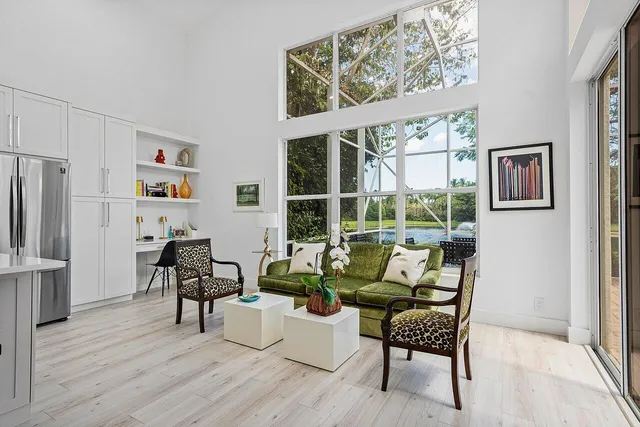 a living room with furniture and a table