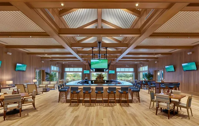 a view of a lake and houses in the background