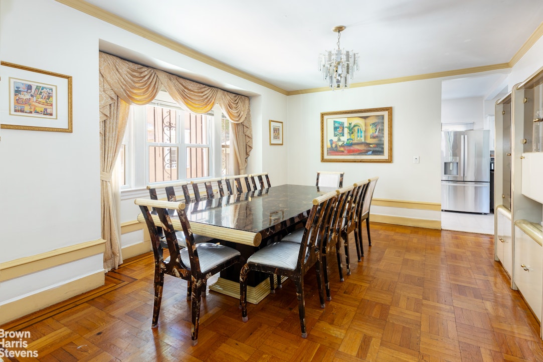 1917 Glenwood Road Brooklyn, NY 11230 - Photo 4 of 22 a view of a dining room with furniture window and wooden floor