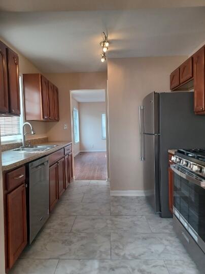 412 West South Street Crown Point, IN 46307 - Photo 6 of 12 a kitchen with stainless steel appliances granite countertop a refrigerator and a stove top oven