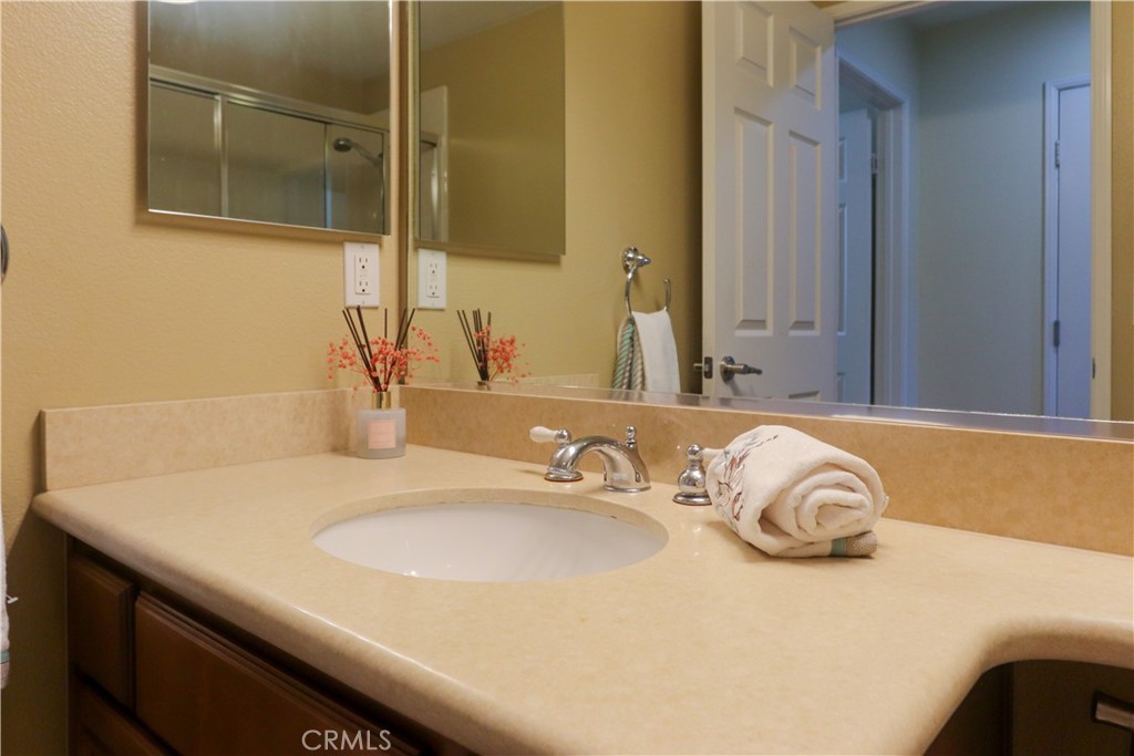 321 Tomko Way Placentia, CA 92870 - Photo 27 of 52 a bathroom with a sink and a mirror