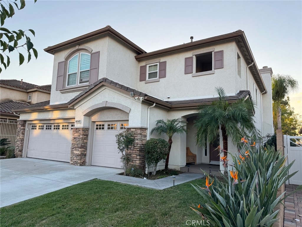 321 Tomko Way Placentia, CA 92870 - Photo 5 of 52 a front view of a house with a yard and entryway